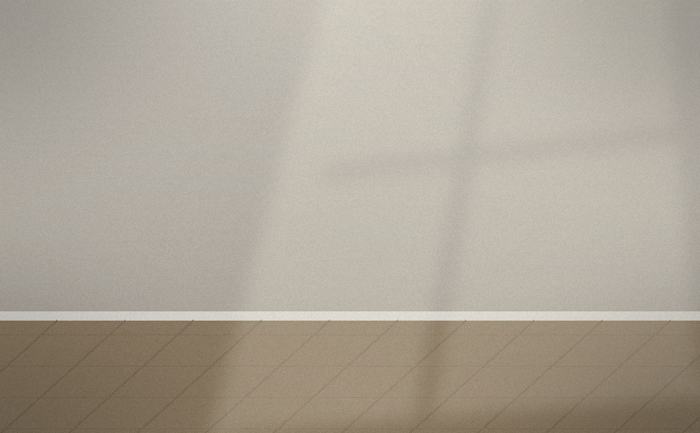 Un piso vacío con la luz de la ventana en la pared